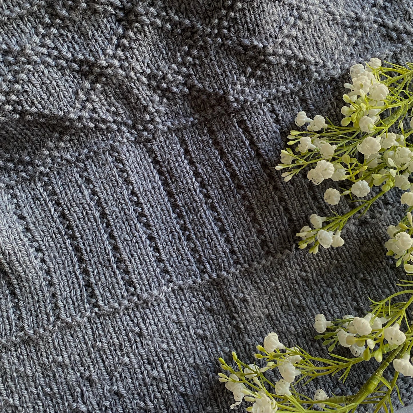 "Daisy" hand knit merino baby cot blanket - Nana Anna NZ