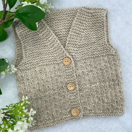 Cosmo hand knit merino baby vest