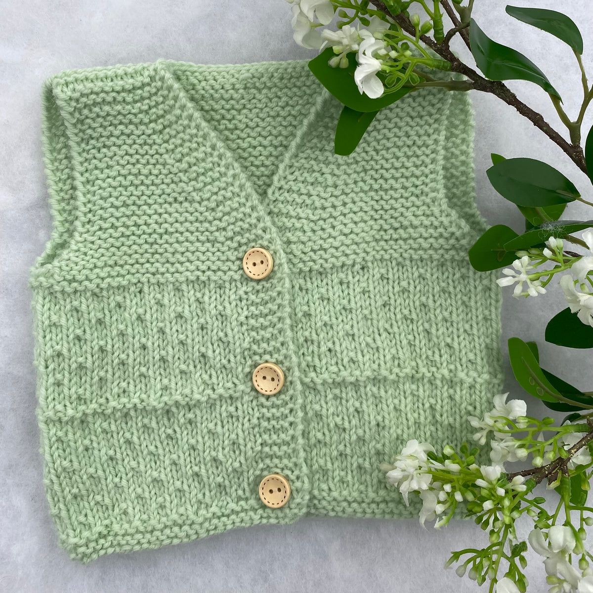 Cosmo hand knit merino baby vest