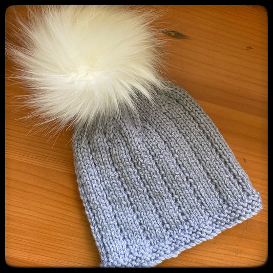 Assorted merino baby beanies and hats