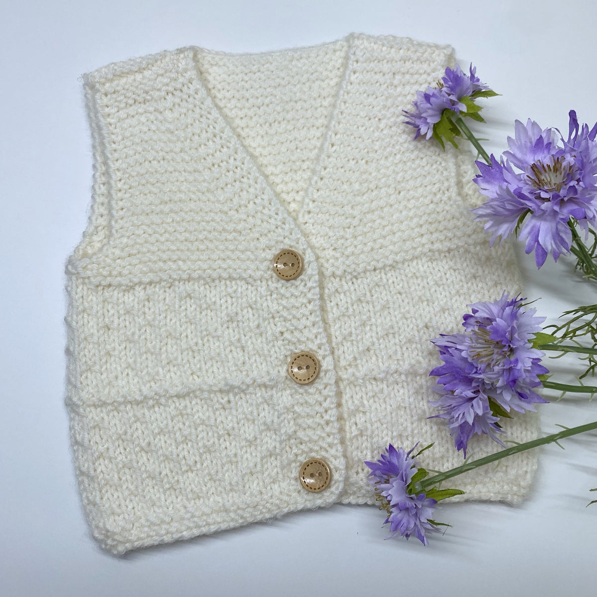 Cosmo hand knit merino baby vest