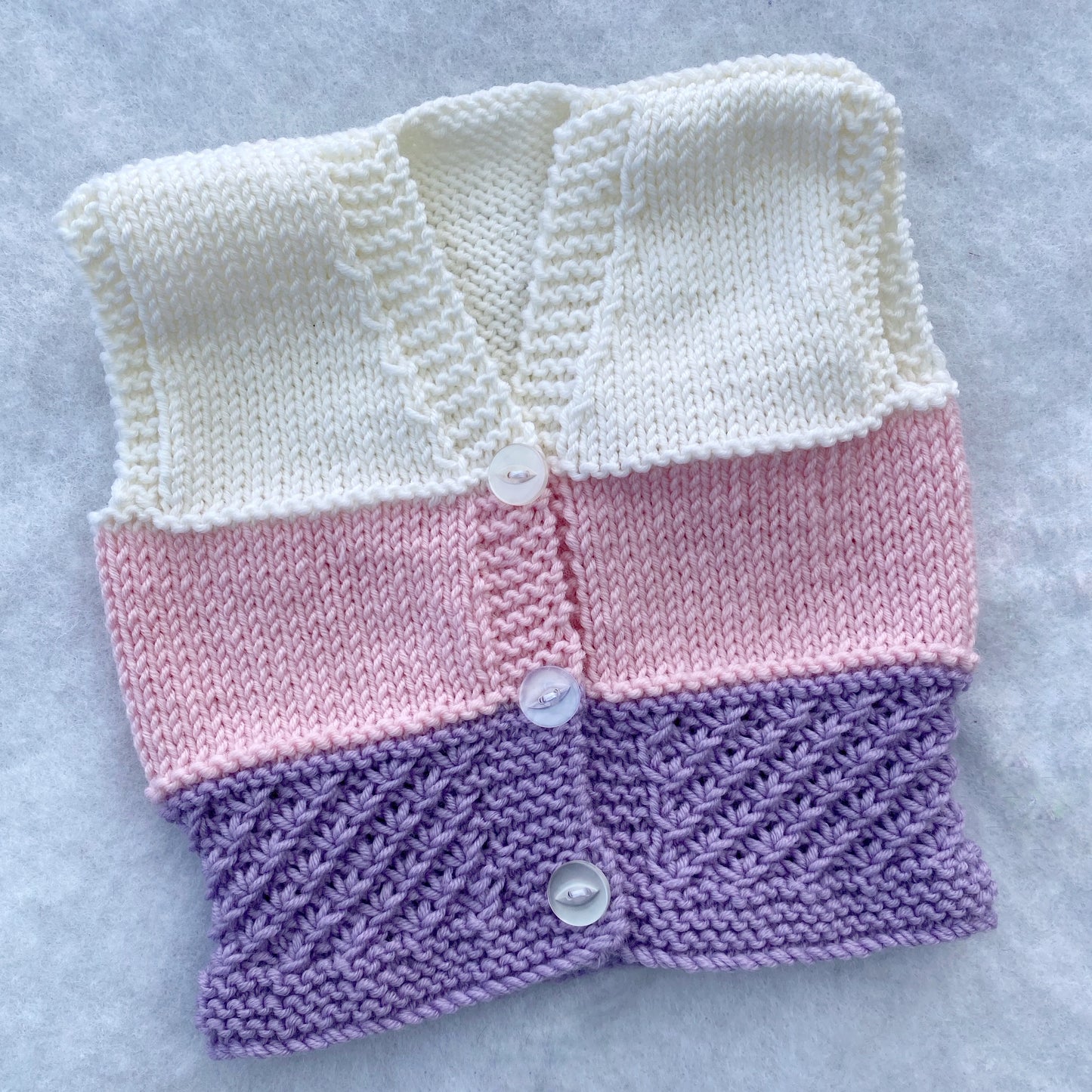 “Daisy” hand knit merino baby vest