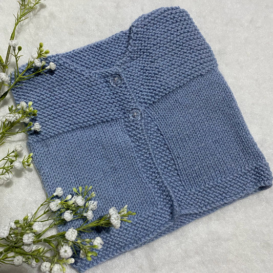 “Millie” hand knit baby vest