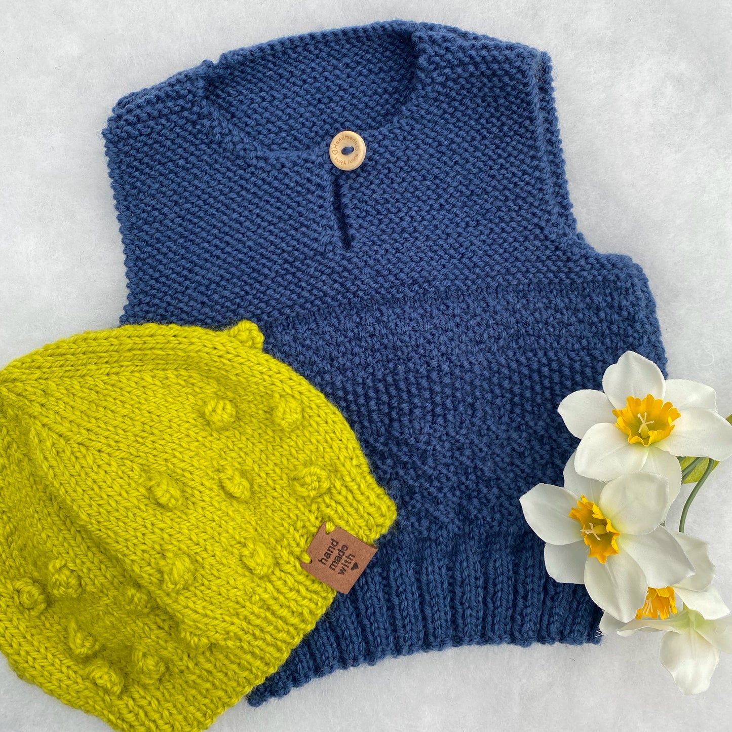 "Phoenix" hand knit merino baby vest set