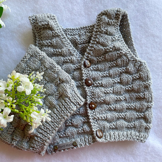 Theodore hand knit merino baby vest (0-3m)